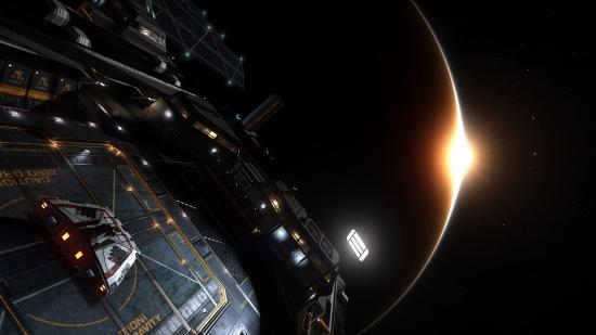 Best space games: Light shining out from behind a planet as a spaceship approaches in Elite Dangerous.